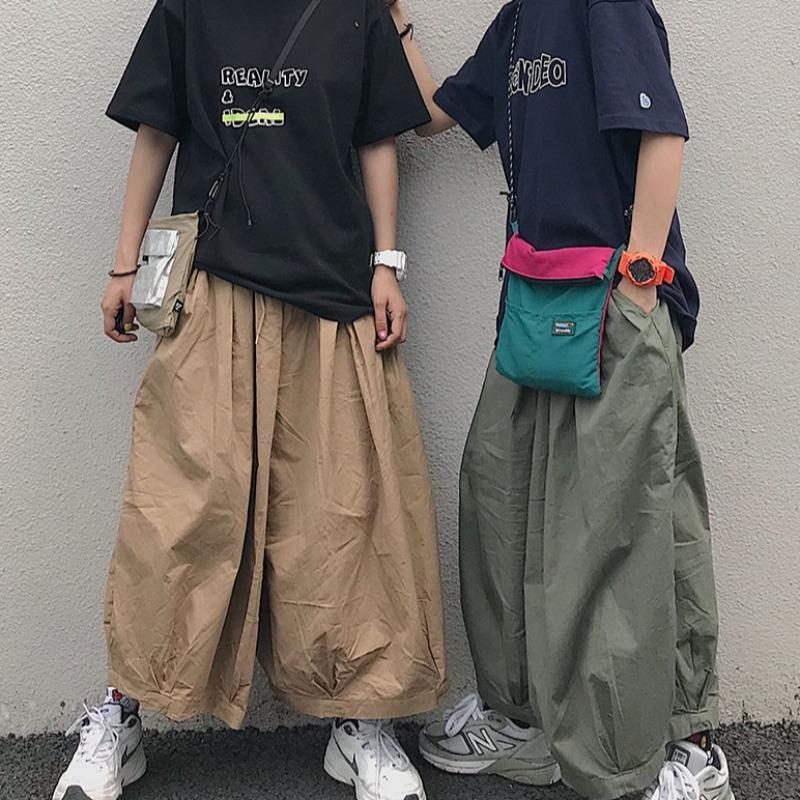 のハラジュク怠惰な風ワイドレッグパンツ男性と女性のゆったりとしたオーバーオールヒップホップペンダント のハラジュク怠惰な風ワイドレッグパンツ男性と女性のゆったりとしたオーバーオールヒップホップペンダント