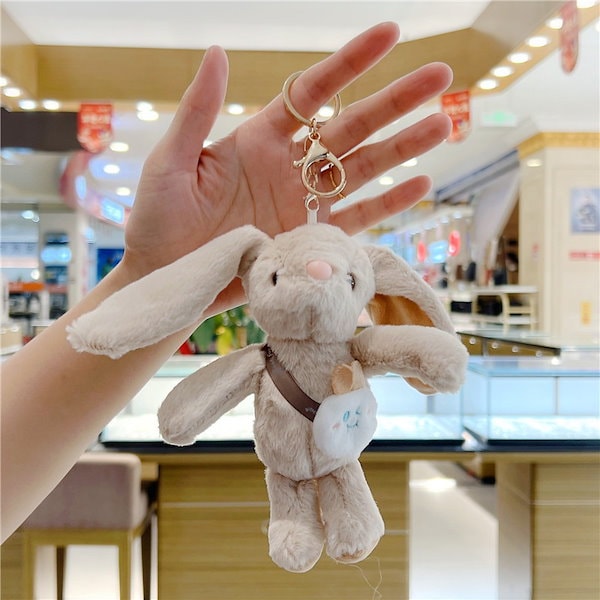 Amazon.co.jp: 引き込み式のウサギのぬいぐるみ - 耳の長い