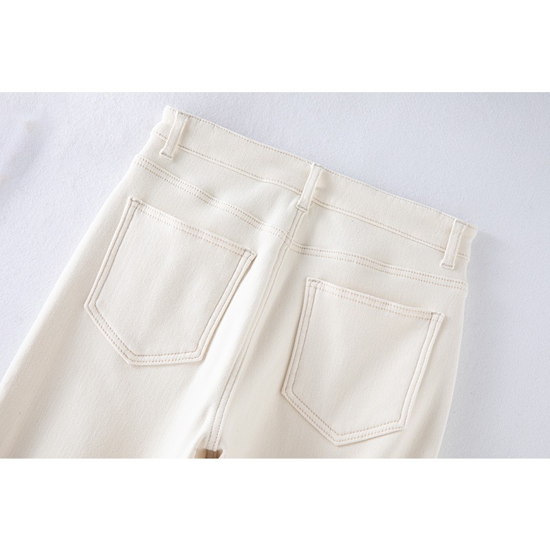 秋と冬の女性のための白いベルベットのストレートジーンズ緩い弾性快適な暖かい厚いベルベットのズボンハイウエスト痩身