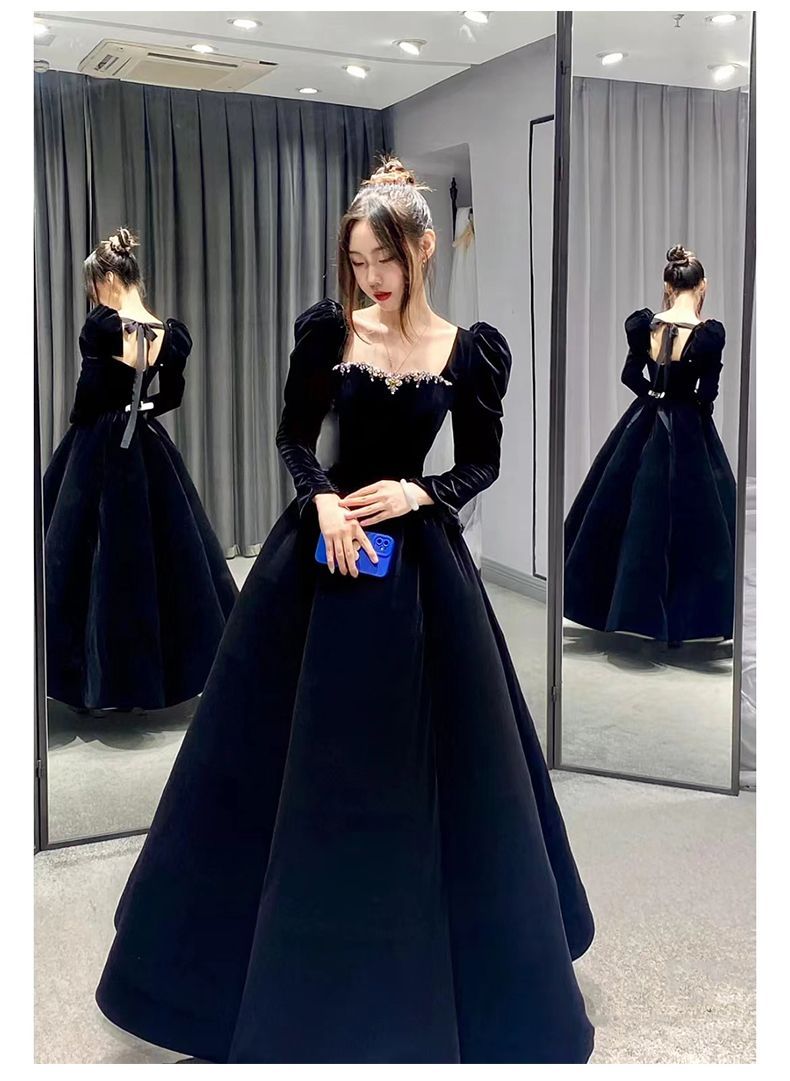 黒のイブニングドレスのスカートの女性の美術受験生の日のホストの長いセクションは通常エレガントな気質を着ることができます 母の日