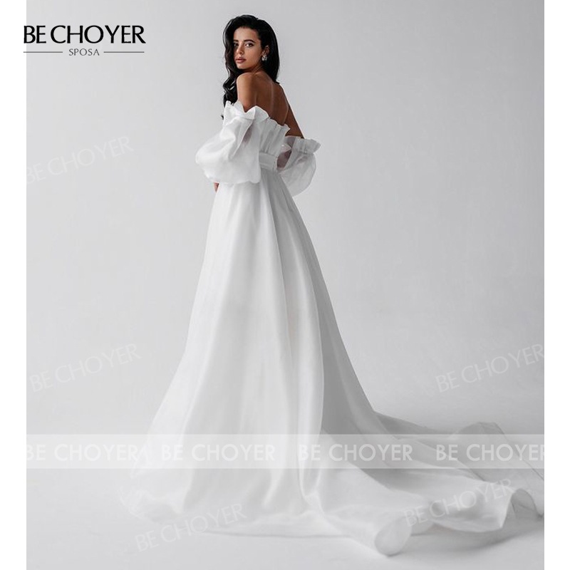 フランス式の長袖の主なウェディングドレスの新型の新婦は胸を拭いて外に出ます フランス式の長袖の主なウェディングドレスの新型の新婦は胸を拭いて外に出ます