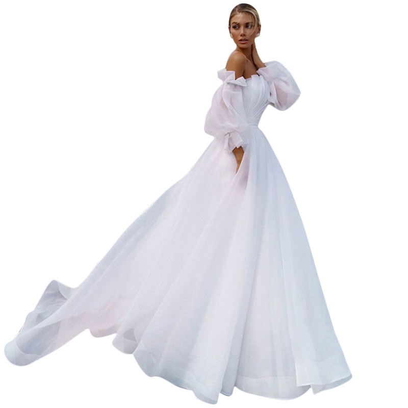 フランス式の長袖の主なウェディングドレスの新型の新婦は胸を拭いて外に出ます フランス式の長袖の主なウェディングドレスの新型の新婦は胸を拭いて外に出ます