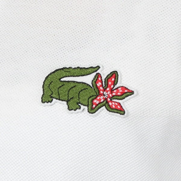 新品タグ付き✨ラコステ × ストレンジャーシングス　コラボ　ポロシャツ　白　36 ラコステ LACOSTE 『Lacoste x Netflix』 ポロシャツ （ホワイト