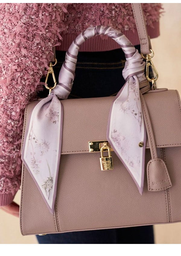 Qoo10] スナイデル ロールカバーパッドロックバッグ ハンドバ