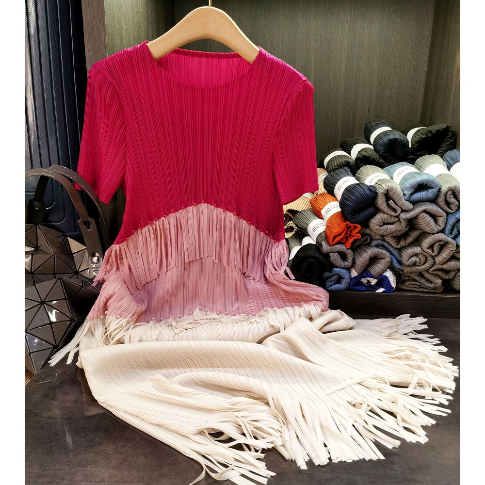 フリンジのしわのワンピースの気質の通勤の丸首の半袖の中で長いスカートの夏