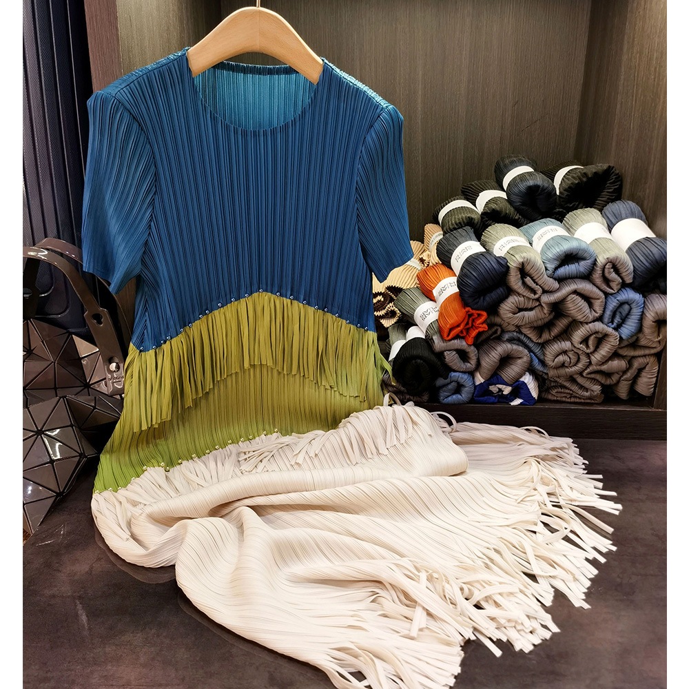 フリンジのしわのワンピースの気質の通勤の丸首の半袖の中で長いスカートの夏