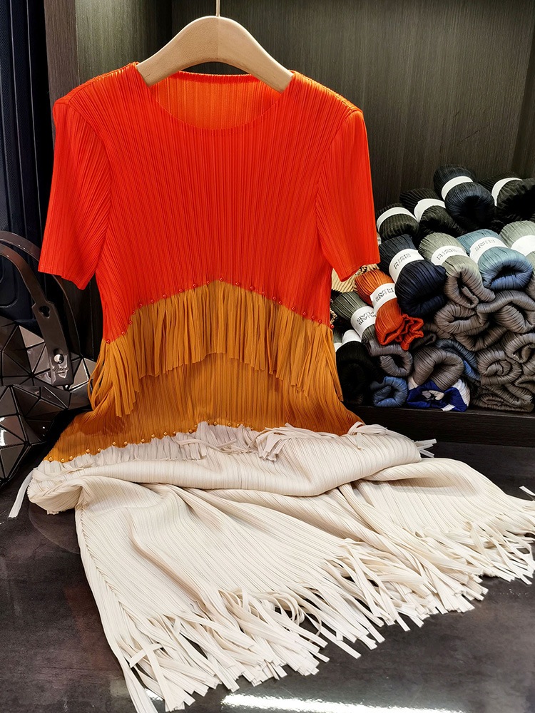 フリンジのしわのワンピースの気質の通勤の丸首の半袖の中で長いスカートの夏