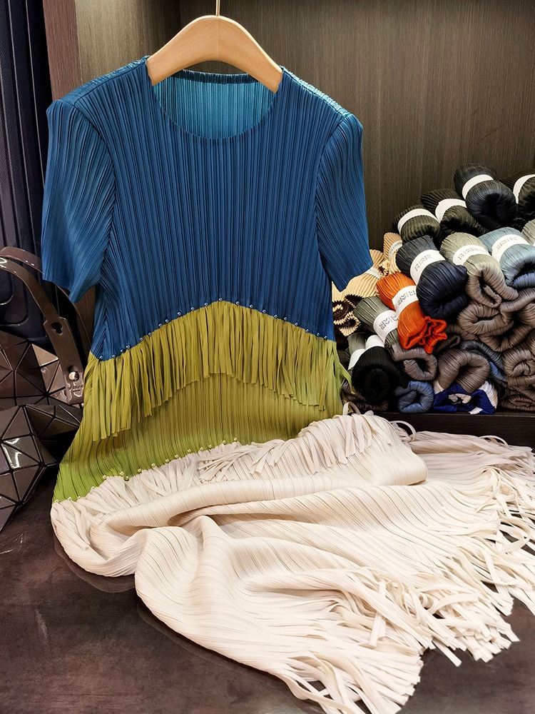 フリンジのしわのワンピースの気質の通勤の丸首の半袖の中で長いスカートの夏