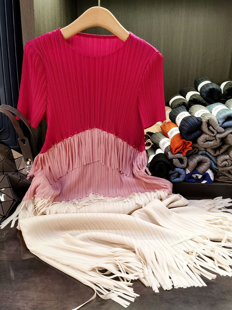 フリンジのしわのワンピースの気質の通勤の丸首の半袖の中で長いスカートの夏