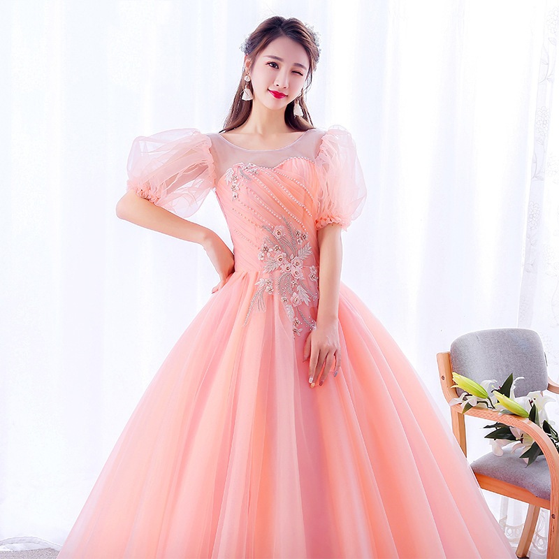ピンクの芸考ドレスの新型一字肩泡袖舞台美声独唱演出服蓬蓬スカートが白く痩せている