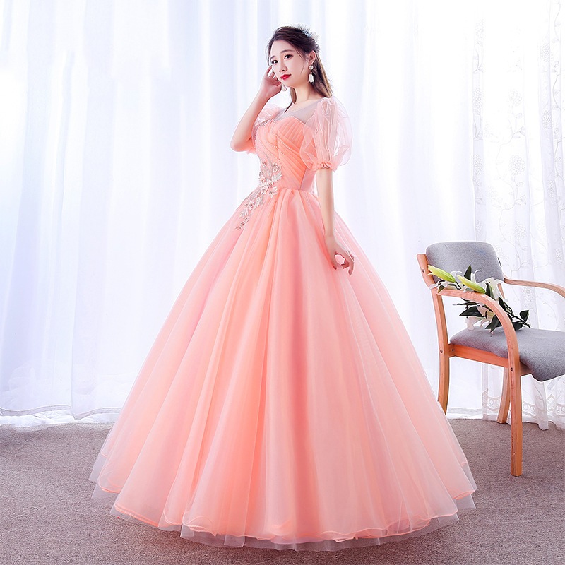 ピンクの芸考ドレスの新型一字肩泡袖舞台美声独唱演出服蓬蓬スカートが白く痩せている