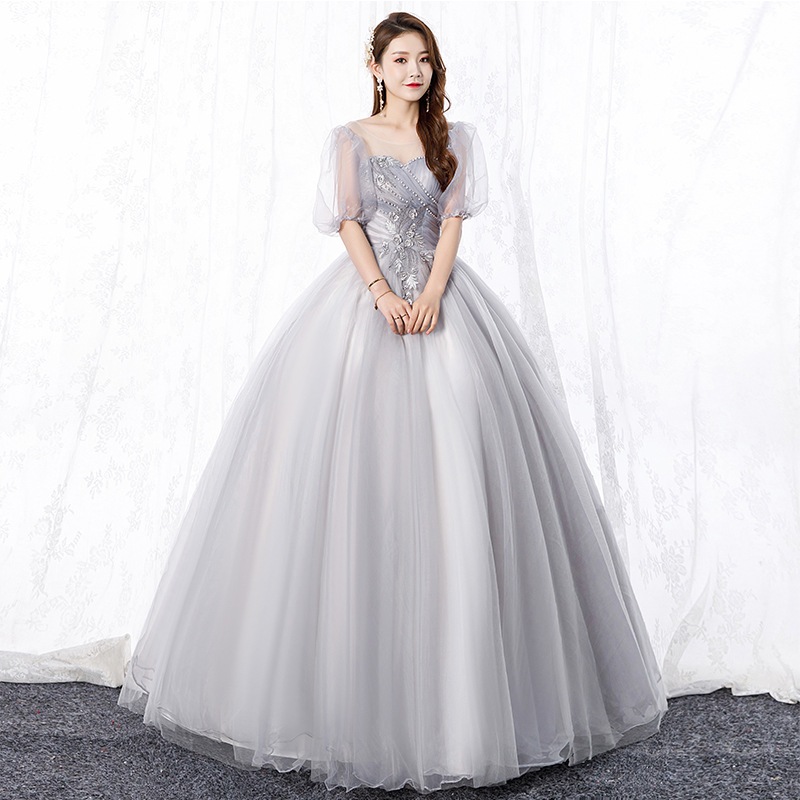 ピンクの芸考ドレスの新型一字肩泡袖舞台美声独唱演出服蓬蓬スカートが白く痩せている