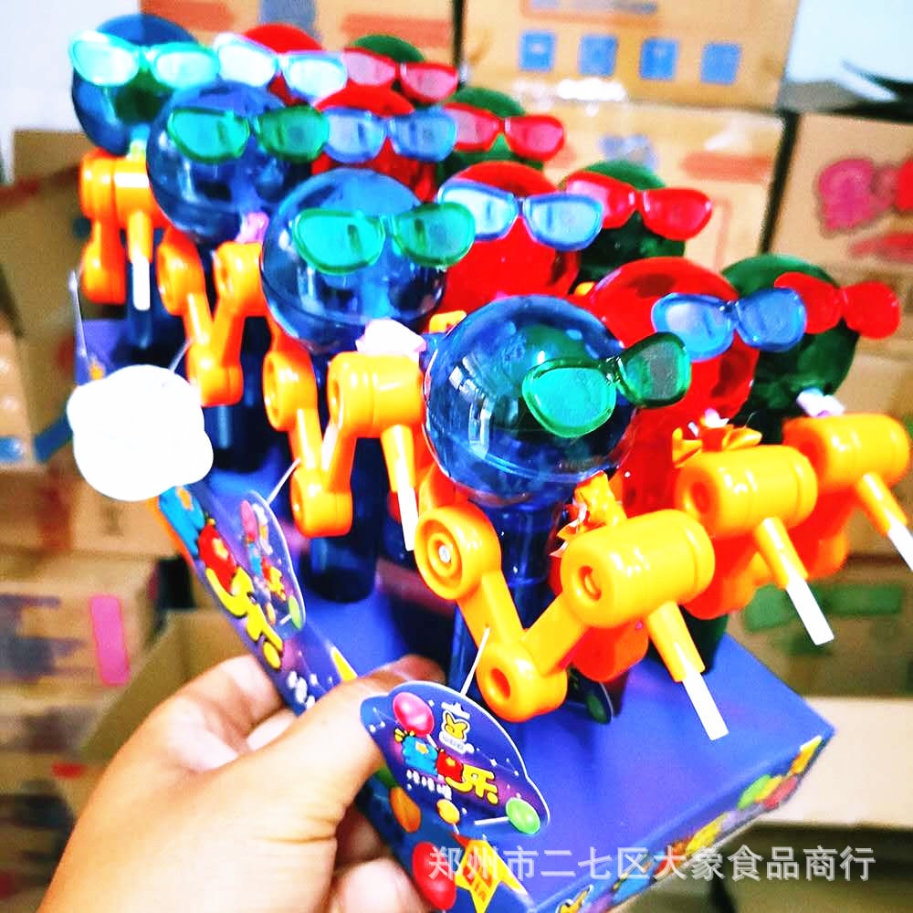 Xingxingle ソーシャル インターネットの有名人のロリポップはおいしくて楽しい子供のおもちゃキャンディ ギフト工場価格卸売ボックス 12 個入り