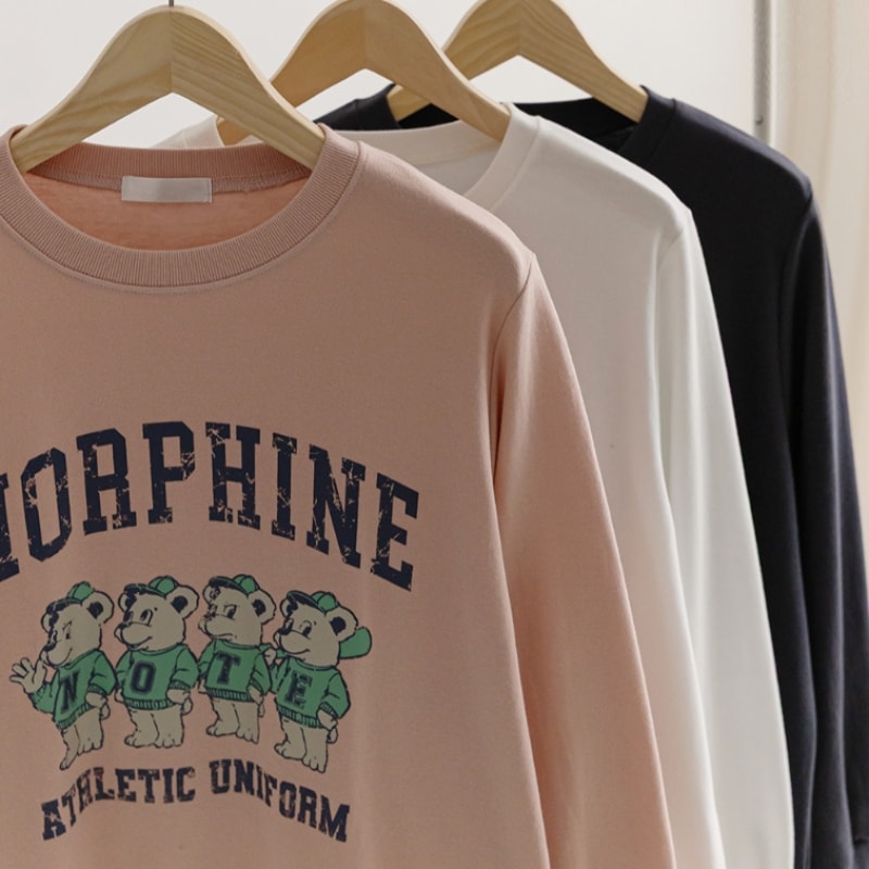 [ELYSIA] クォータンプリントスリットスウェットシャツ