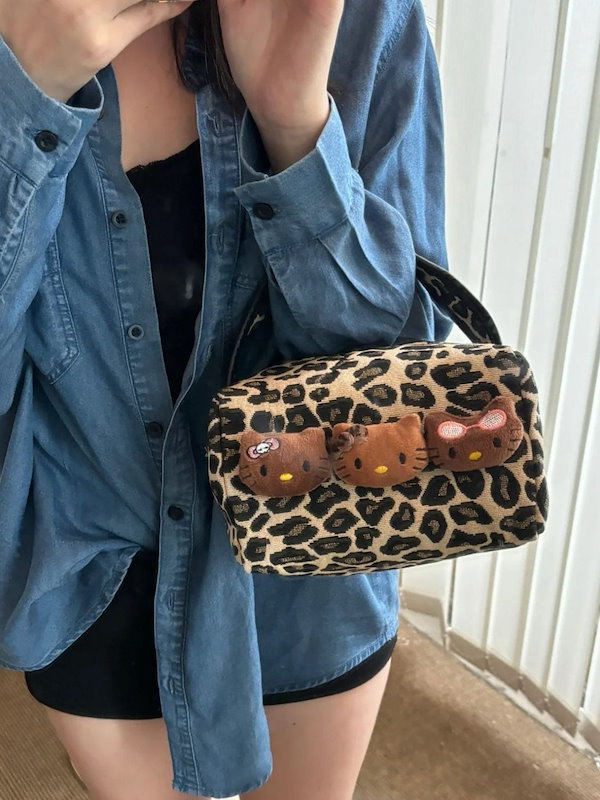 Qoo10] ヒョウ柄ポーチキティポーチ小人数高級大容