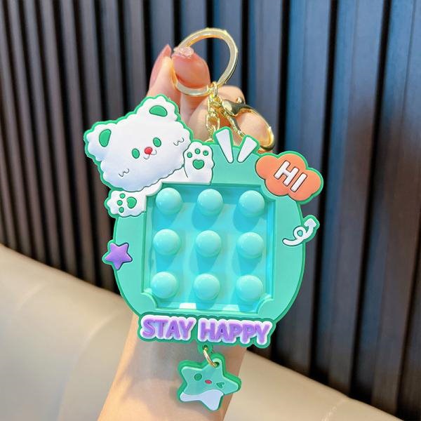 Qoo10] キーホルダー ゲーム プッシュポップ プ