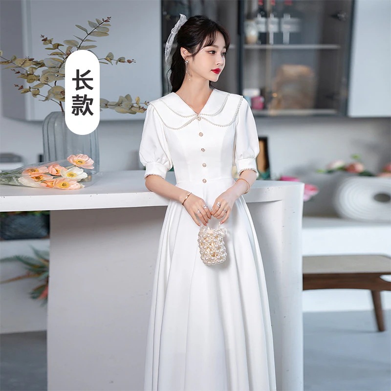 白い小さなドレスは2025年の女性のための宴会ドレスで通常着用できます 白い小さなドレスは2025年の女性のための宴会ドレスで通常着用できます