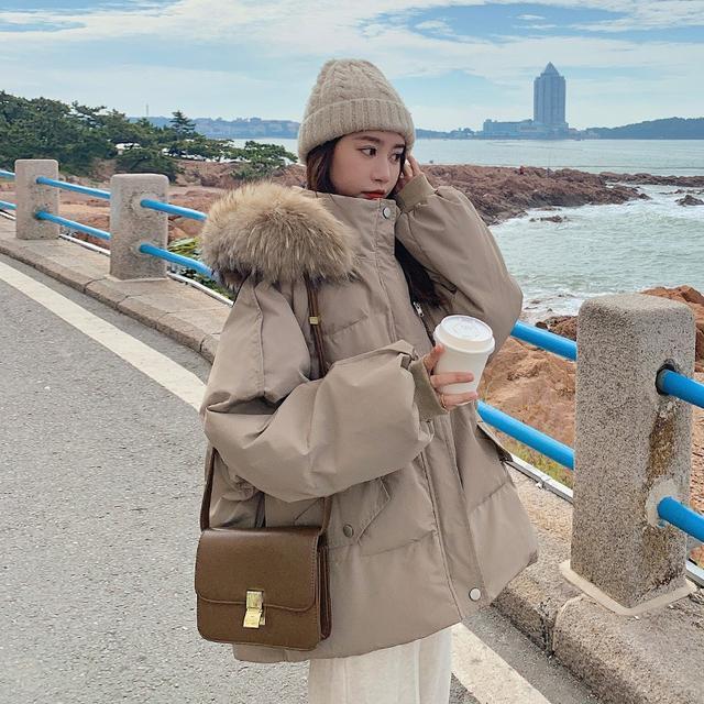 ダウンジャケット女2023年冬の新型デザイン感がゆるい学生が大きな襟のコートを厚くしている ダウンジャケット女2023年冬の新型デザイン感がゆるい学生が大きな襟のコートを厚くしている