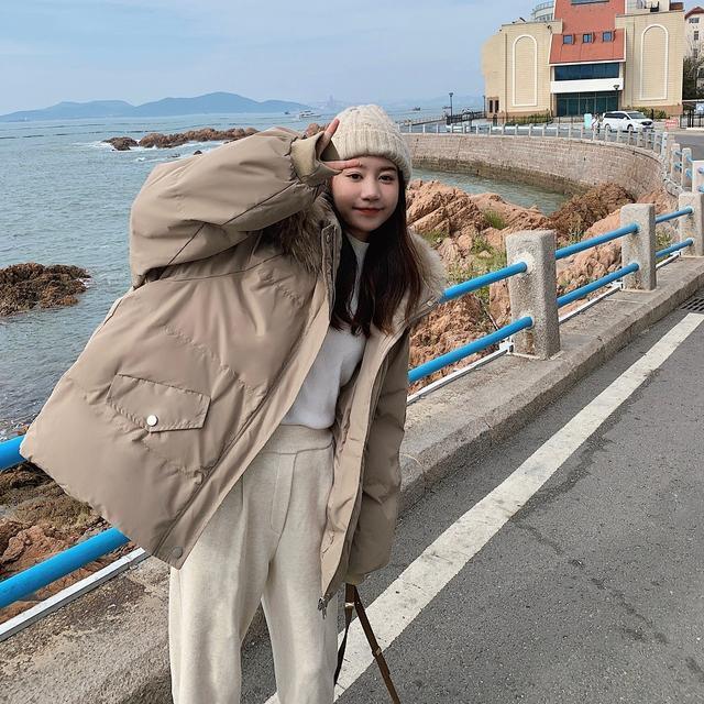 ダウンジャケット女2023年冬の新型デザイン感がゆるい学生が大きな襟のコートを厚くしている ダウンジャケット女2023年冬の新型デザイン感がゆるい学生が大きな襟のコートを厚くしている