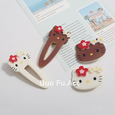 Qoo10] 【3日で出荷】日焼けキティ ヘアクリップ : バッグ・雑貨