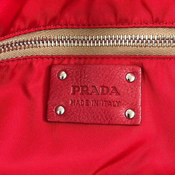 Qoo10] PRADA くま 電話 ライト ブローチ付き オレン