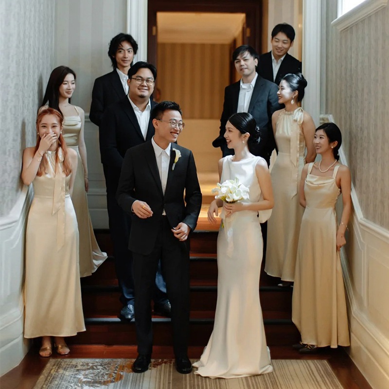 充填された花嫁介添人服2025サテンシャンパンカラーハイエンドの感覚は小さなドレスに着用できます写真花嫁介添人服