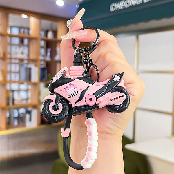 Qoo10] サンリオオートバイ機関車キーホルダースト