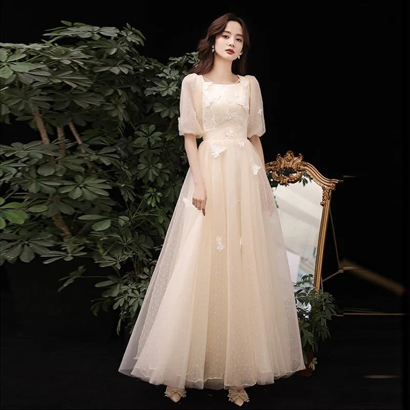 女性用バンケットイブニングドレス2024夏気質シャンパンカラーアートテストドレスは通常時に着用してスリムに見せることができます
