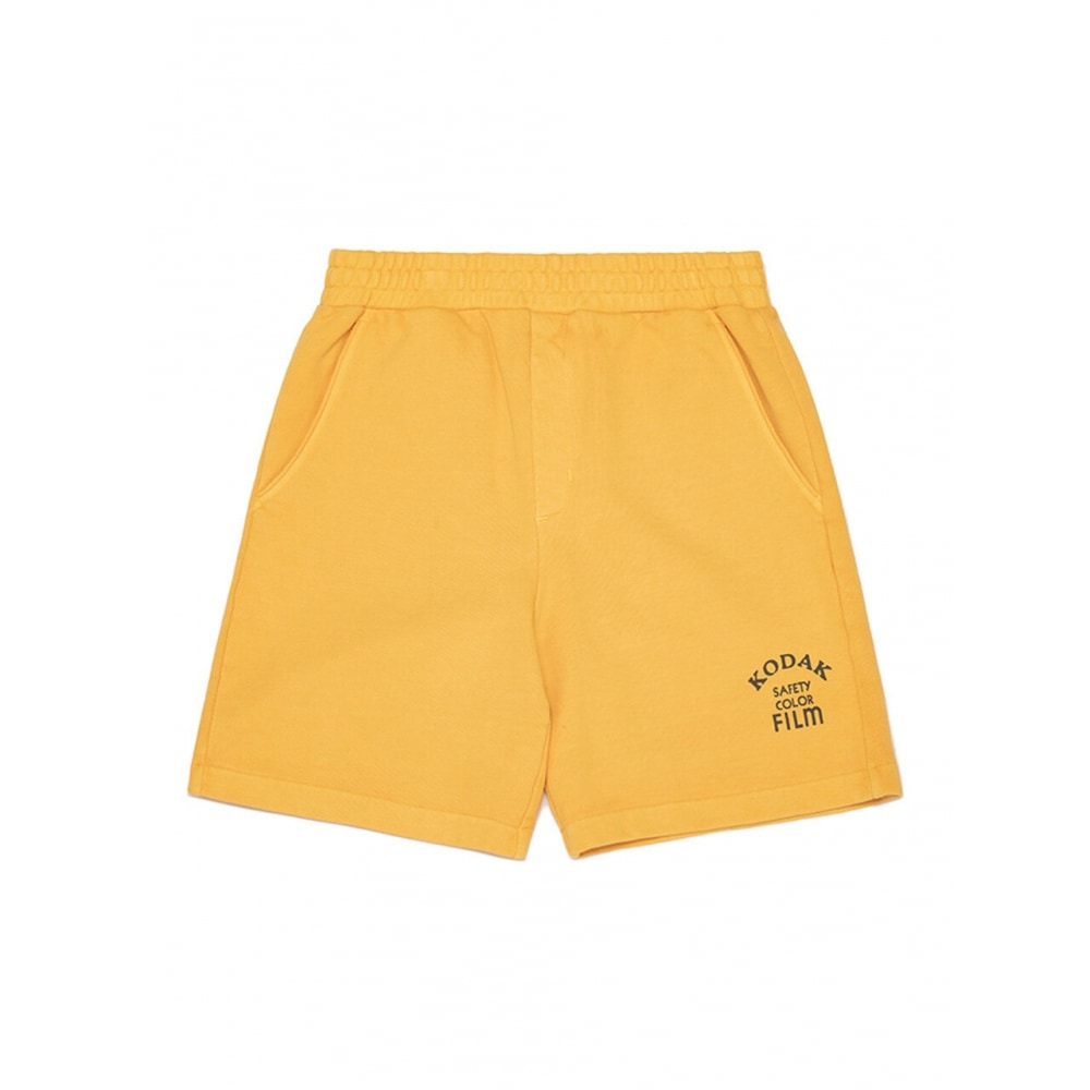 KODAK Apparel シネコダック ピグメントダイイング ツィリショーツ MUSTARD
