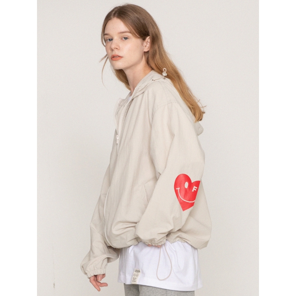 GRAVERエルボハートスマイルウィンドブレーカーアイボリー