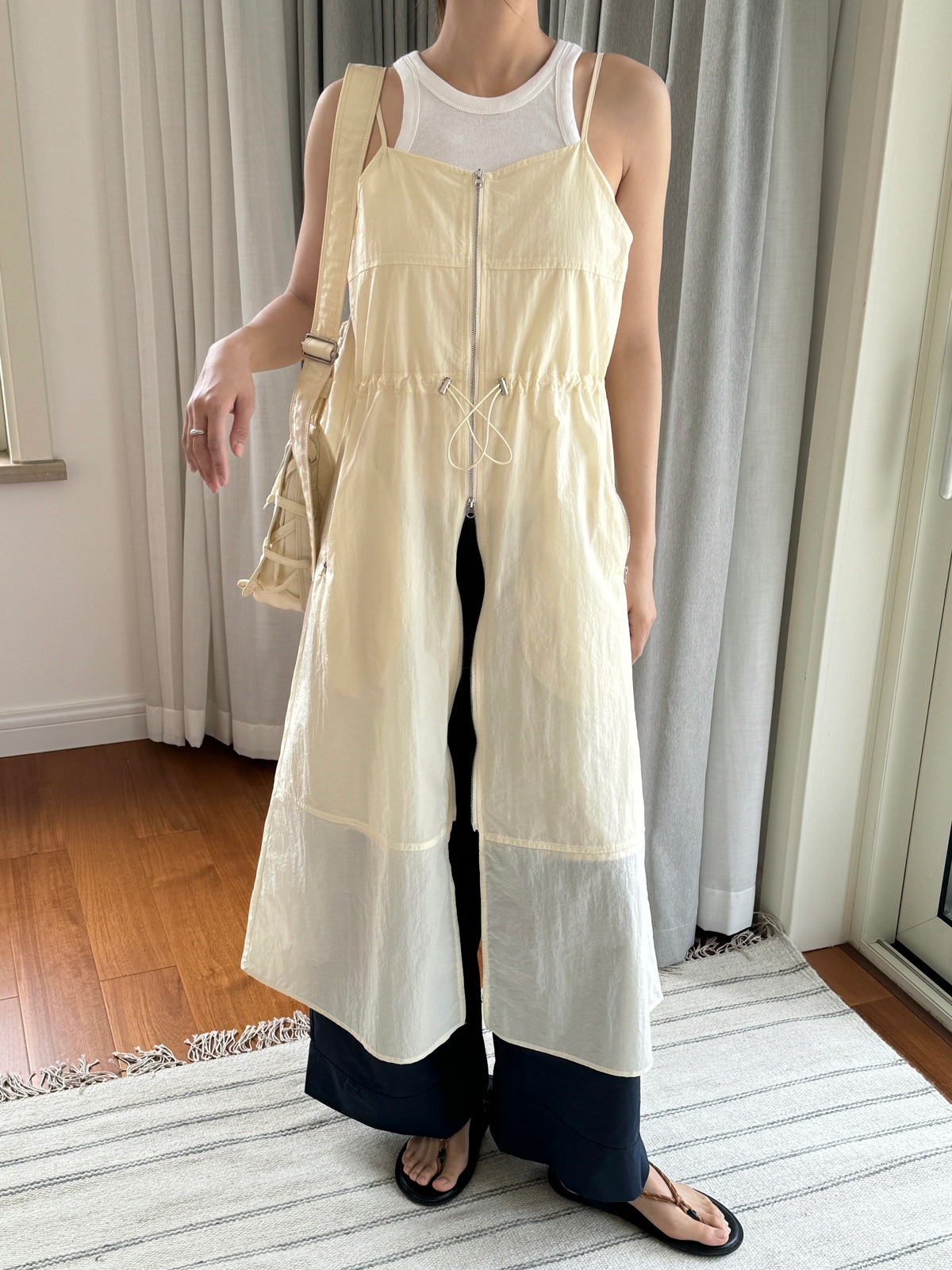 夏の新型韓国版の怠惰なカジュアルファスナーのストラップのワンピースはやせて腰の快適なカジュアルなロングスカートの女性を収めます