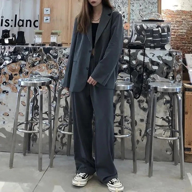 春と秋に着る女性用のゆったりとしたニッチな韓国風のエレガントなツーピース スーツ: スリムなブレザーと床までの長さのズボン