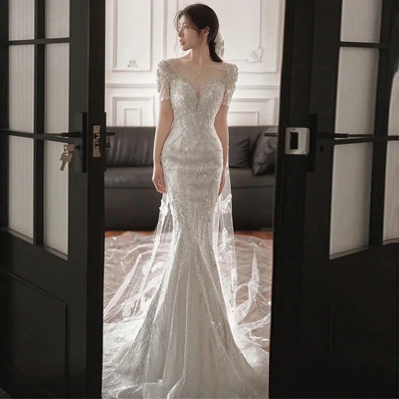 軽いウェディングドレス花嫁2025新しいテールドレス小さな人々が外出するための感ガーゼテール乾杯服