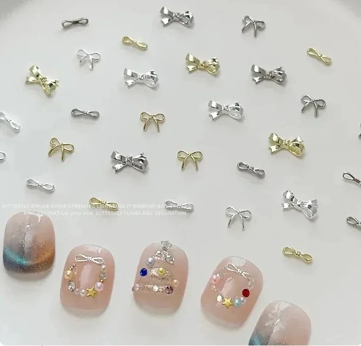 【10点セット】ゴールドとシルバーのリボン シンプルで光沢のある金属合金 ネイルアートの装飾 マニキュアデザイン パーツ チャーム 30個