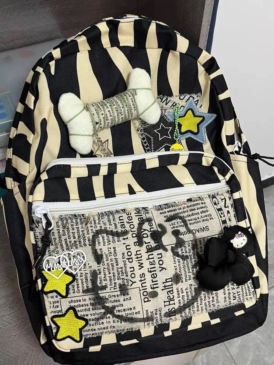 【2個買うと1個無料】サンリオメガ割選べる福袋-超人気ハローキティ ハローktドゥ オールドゼブラ柄 カレッジスタイル バックパック ボーン 大容量福袋2025