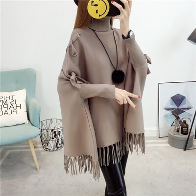 アウター 上着 ポンチョ 袖あり 長袖 タートルネック Aライン フリンジ かわいい 大人可愛い シンプル カジュアル おしゃれ お洒落 大人可愛い 大人女子 こなれ感 ラフ ルーズ 主役級 存在感