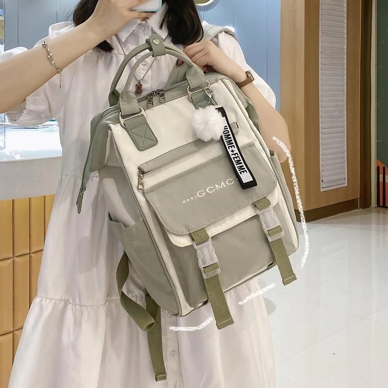 新型カバン女子学生ins風韓国版中学生森系百合衝突色リュックサック旅行ランドセル