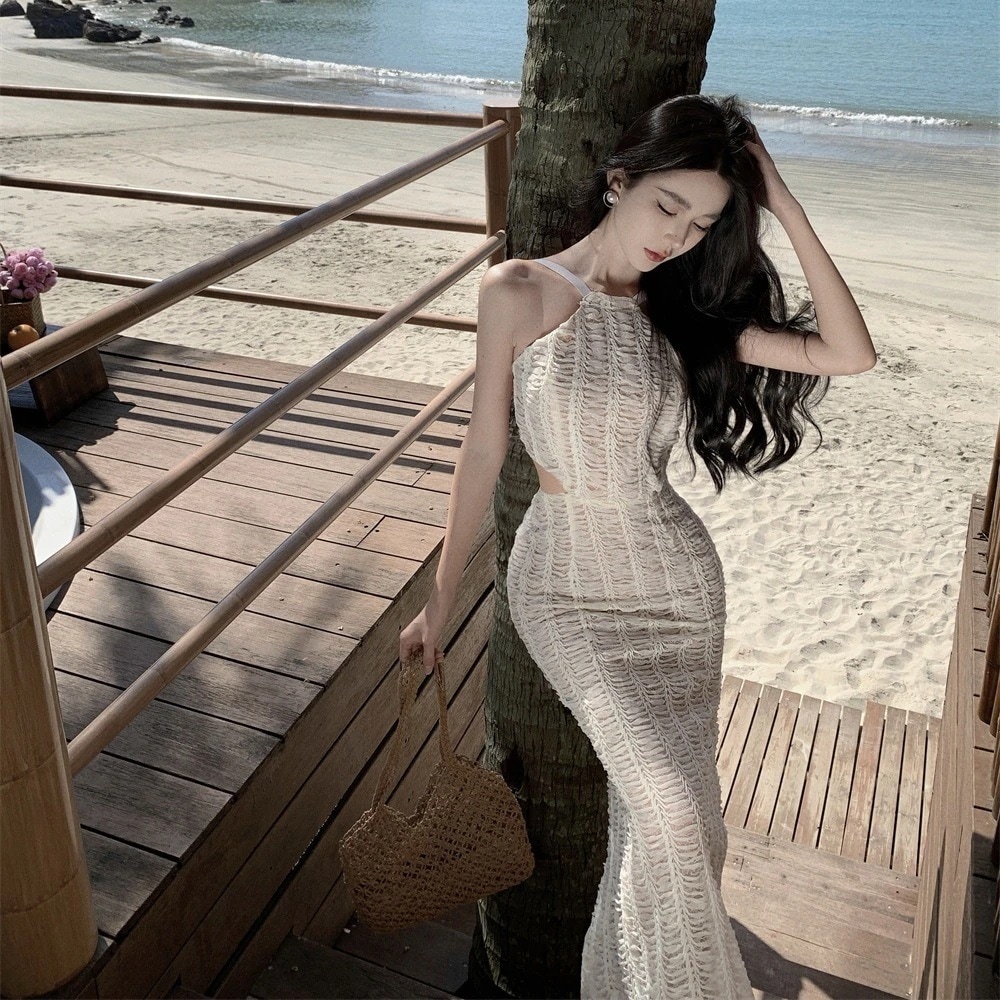 セクシーなホットガール背中の開いたホルタードレス女性の夏の純粋な欲望の休日スタイルニッチスリムスリムニットロングスカート