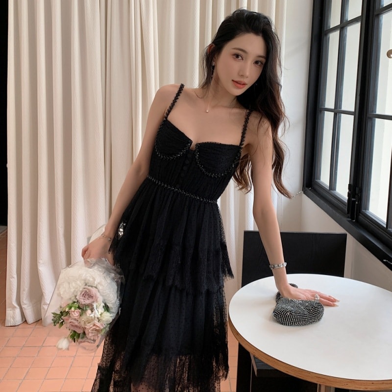 有名人の女性の服2025春と夏の新しいクラシックブラック・トレンドダイヤモンドドレスセクシーなスリングロングスカート