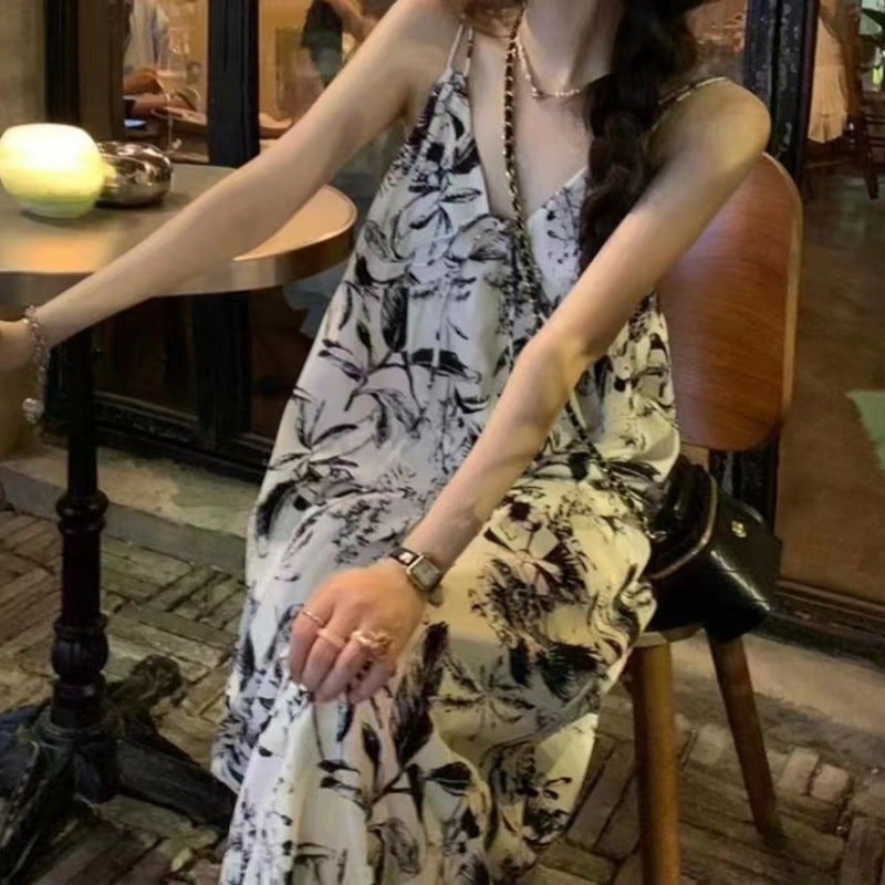 サスペンダードレス夏インクカラーサスペンダードレス女性用春と夏ゆったり怠惰なカジュアルフェイク花柄ロングスカート 4,882円