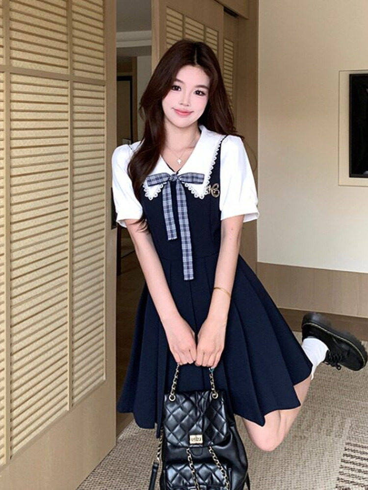 レトロなカレッジスタイルのフェイクツーピース女性用夏物大きいサイズぽっちゃりさん向け着痩せ効果のあるベビードール襟プリーツスカート