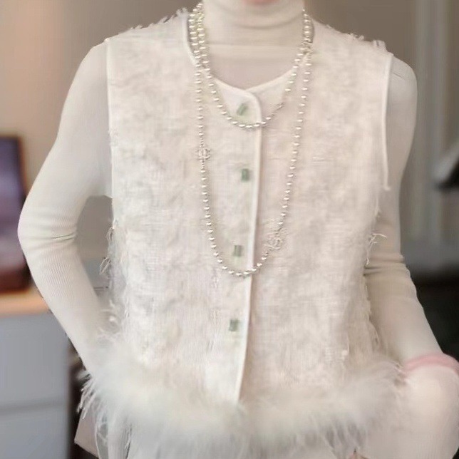 シャギーベスト ノースリーブ フェザー ファートップス フェザーベスト 白 ホワイト シャギー ジレ ファー ベスト 韓国 レディース オルチャン ホワイト チョッキ