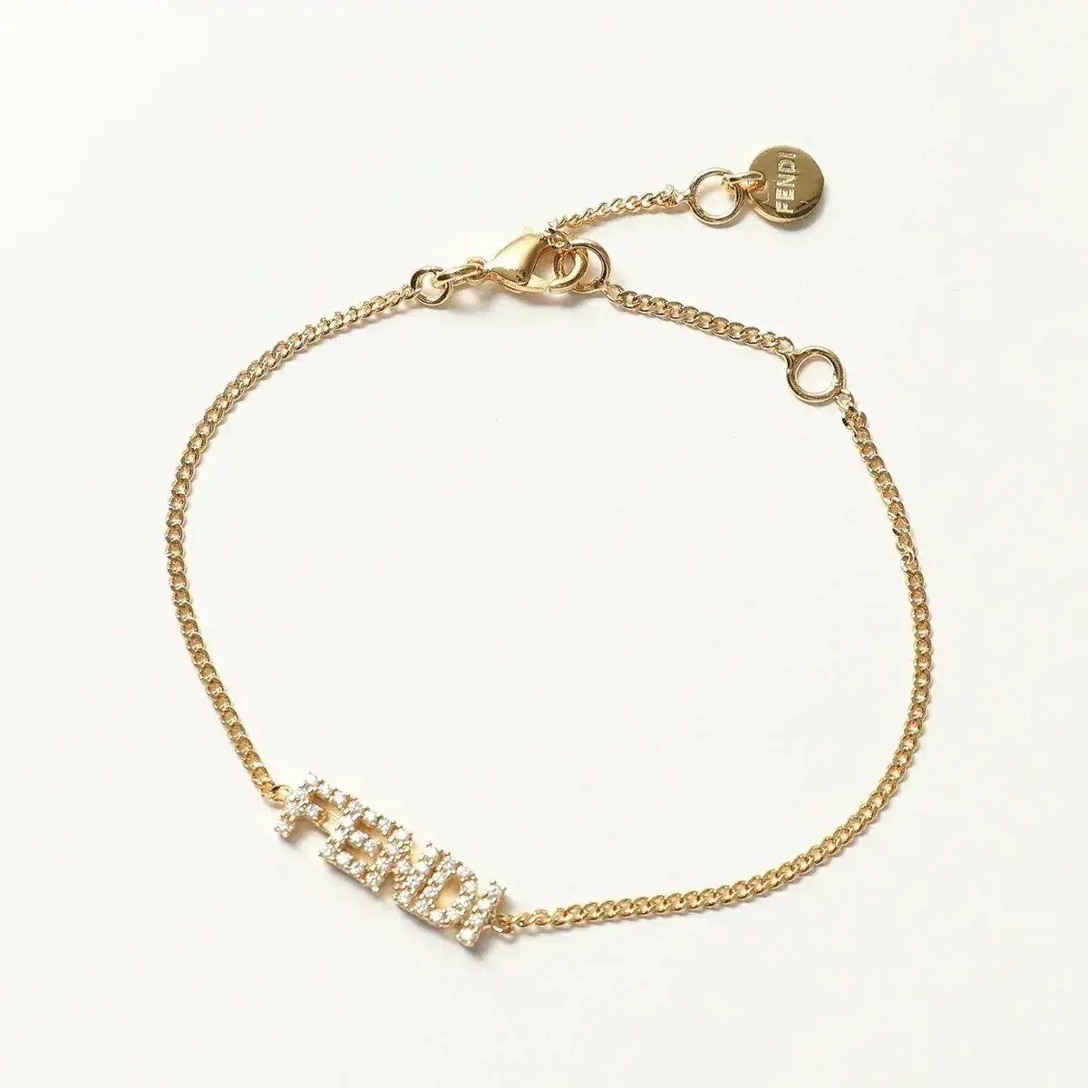 FENDI フェンディ ブレスレット 8AH257 A44G レディース ロゴ クリスタル アクセサリー F089U/SOFT-GOLD+CRYSTAL 30,672円