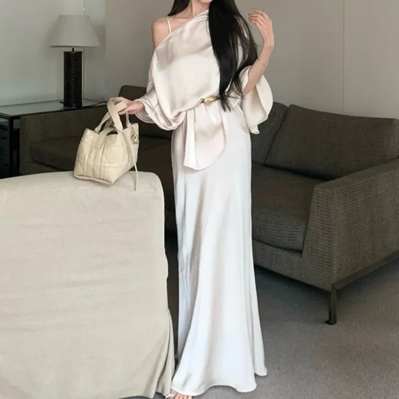 ゆったりとしたオフショルダーのトップスとフィッシュテールのドレスが特徴的な春と秋向けの高級フレンチスタイルのレディースツーピーススーツ