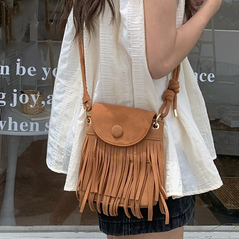 ショルダーバッグ スマホポーチ タッセル (T) 4,908円