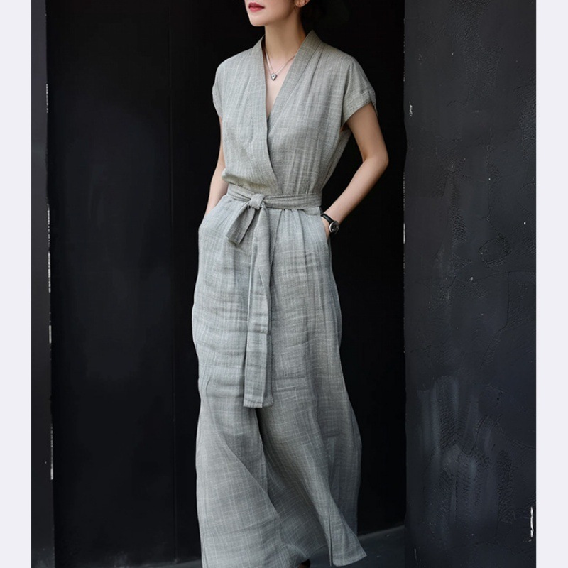 灰色の綿の麻の気質のワンピースの女性の夏の新型の高級感ハイエンドの精緻な腰のvネックのスカートを収めます
