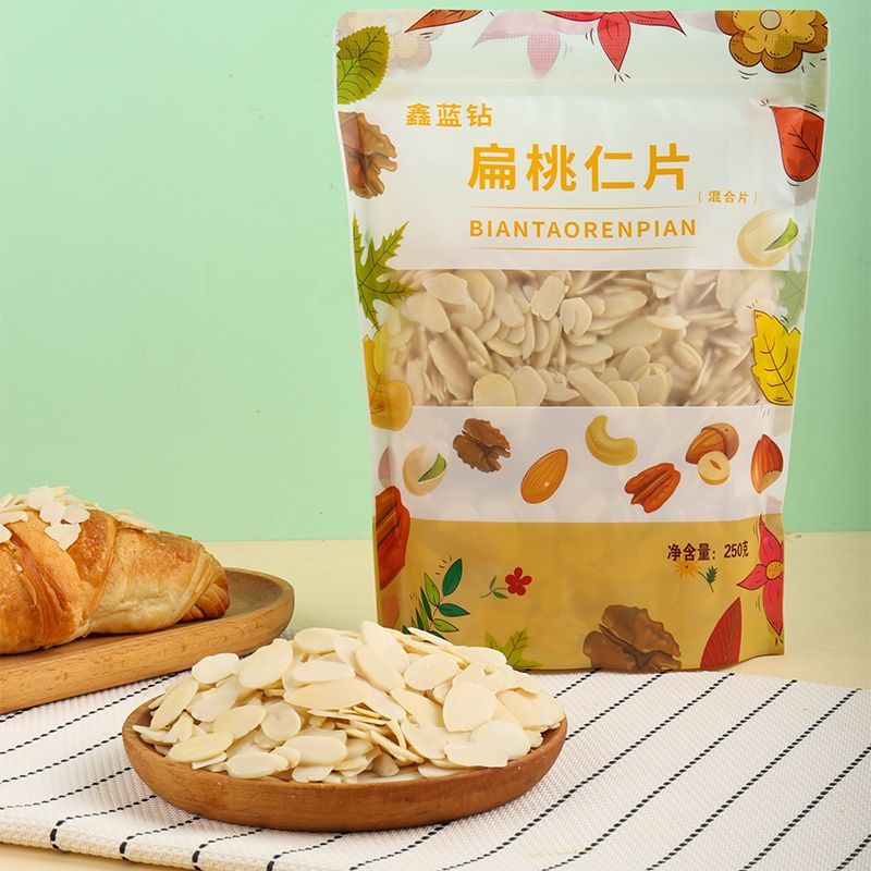 鑫蓝钻金山熟杏仁片斤巴旦木糯米船蛋糕装饰混合片扁桃仁半斤 **Translation:** 新藍鑽金山熟杏仁片（約250克）巴旦木糯米船蛋糕装饰混合片扁桃仁半斤