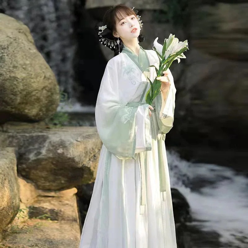 漢服の女性のジンスタイルクロスカラーウエストレングスアンダースカートプリーツスカート古代衣装刺繍春と秋の妖精のスーツ