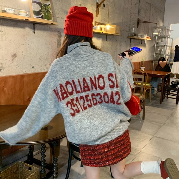 韓国ファッション オーバーフィット バックライン レタリング 半ジップアップ ニット 5,342円