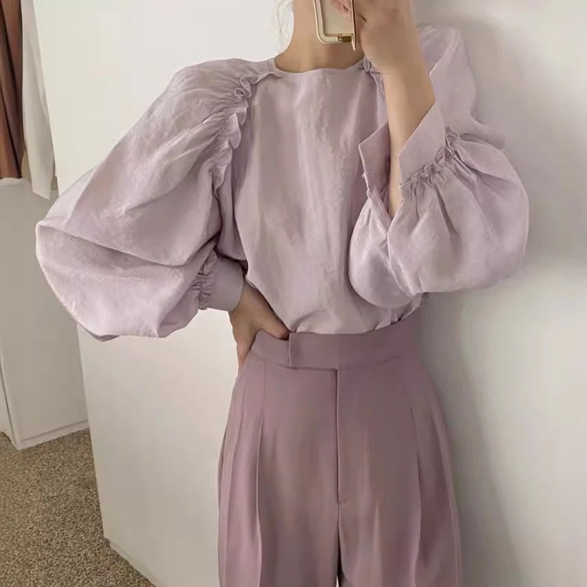 春シンで優しいクリーム杏丸首ゆるい純色カジュアル泡袖シャツ上着女